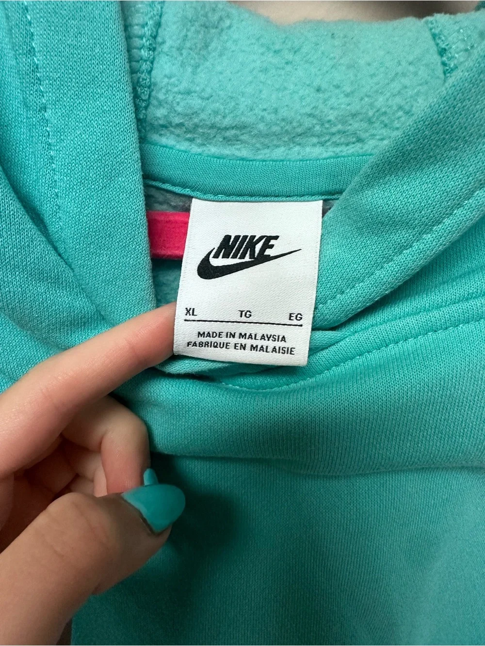 Nike Turquoise Hoodie with White Tag Logo